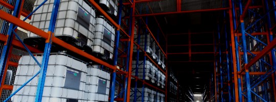 IBC Liquid Containers stacked in Warehouse